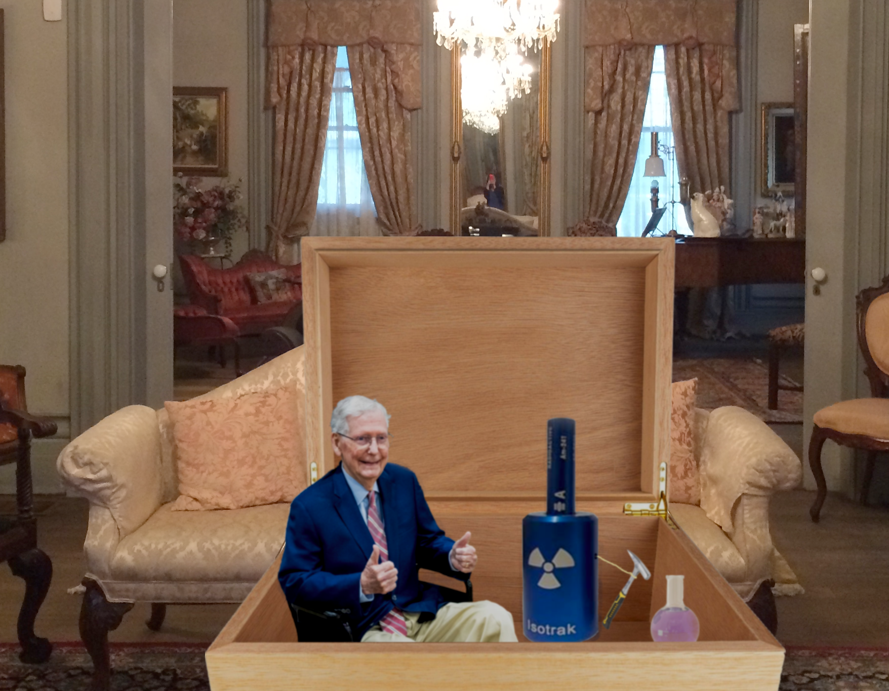Image showing a smiling Sen. McConnell entering a box with a radioactive source and poison, Schrodiner's-cat style.